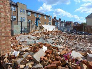 Rubble from the demolished building