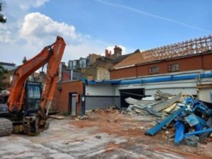 Excavator onsite at Tooting demolition site