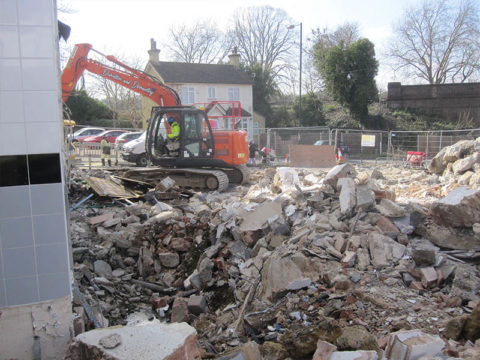 metal fuel container demolition excavation