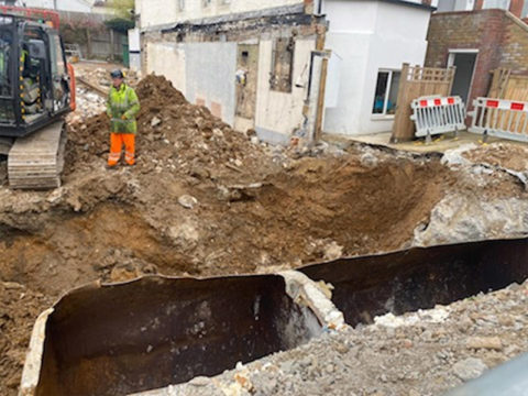 metal fuel container demolition excavation