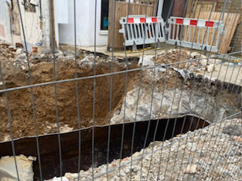 metal fuel container demolition excavation