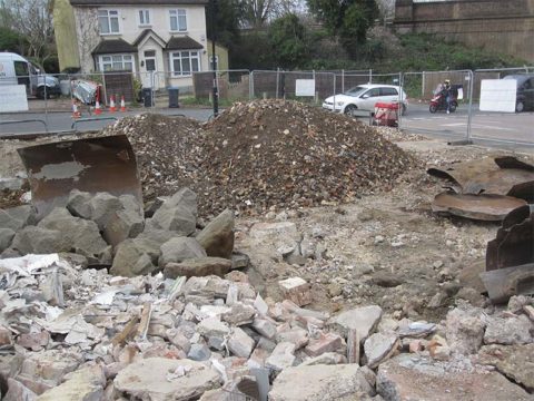 metal fuel container demolition excavation