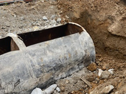 metal fuel container demolition excavation