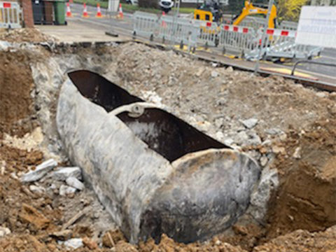 metal fuel container demolition excavation